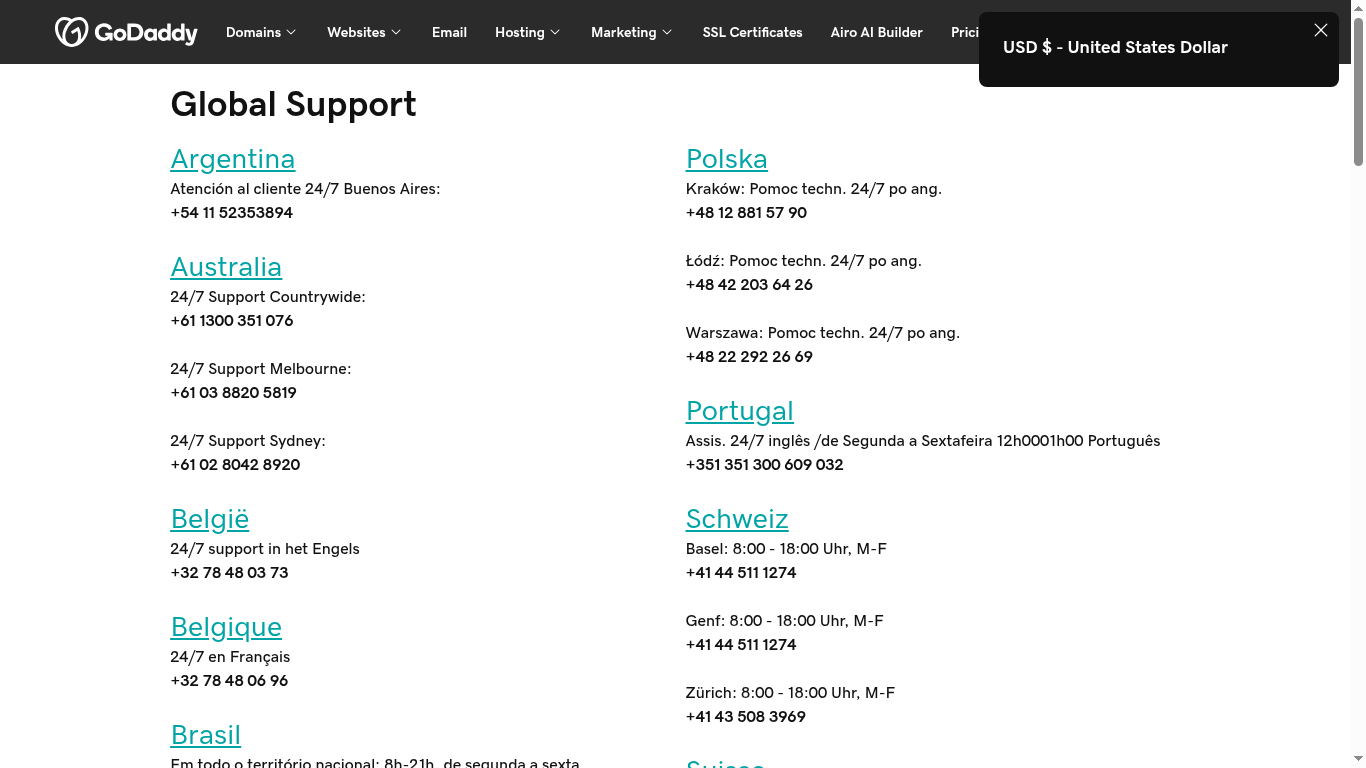GoDaddy contact support screenshot showing 24/7 global support options - Bluehost vs GoDaddy comparison